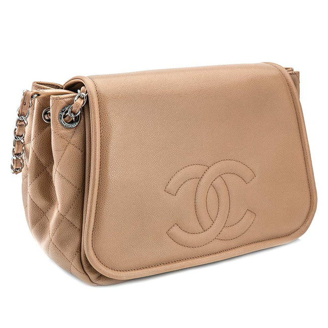 Product Photography Of Beige Chanel Purse